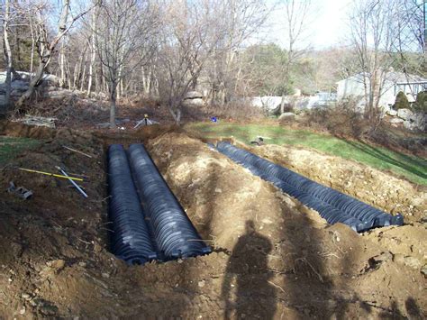 leech field working but wet above distribution boxes|leaching field repair.